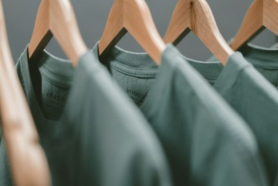 T-shirts hanging in store